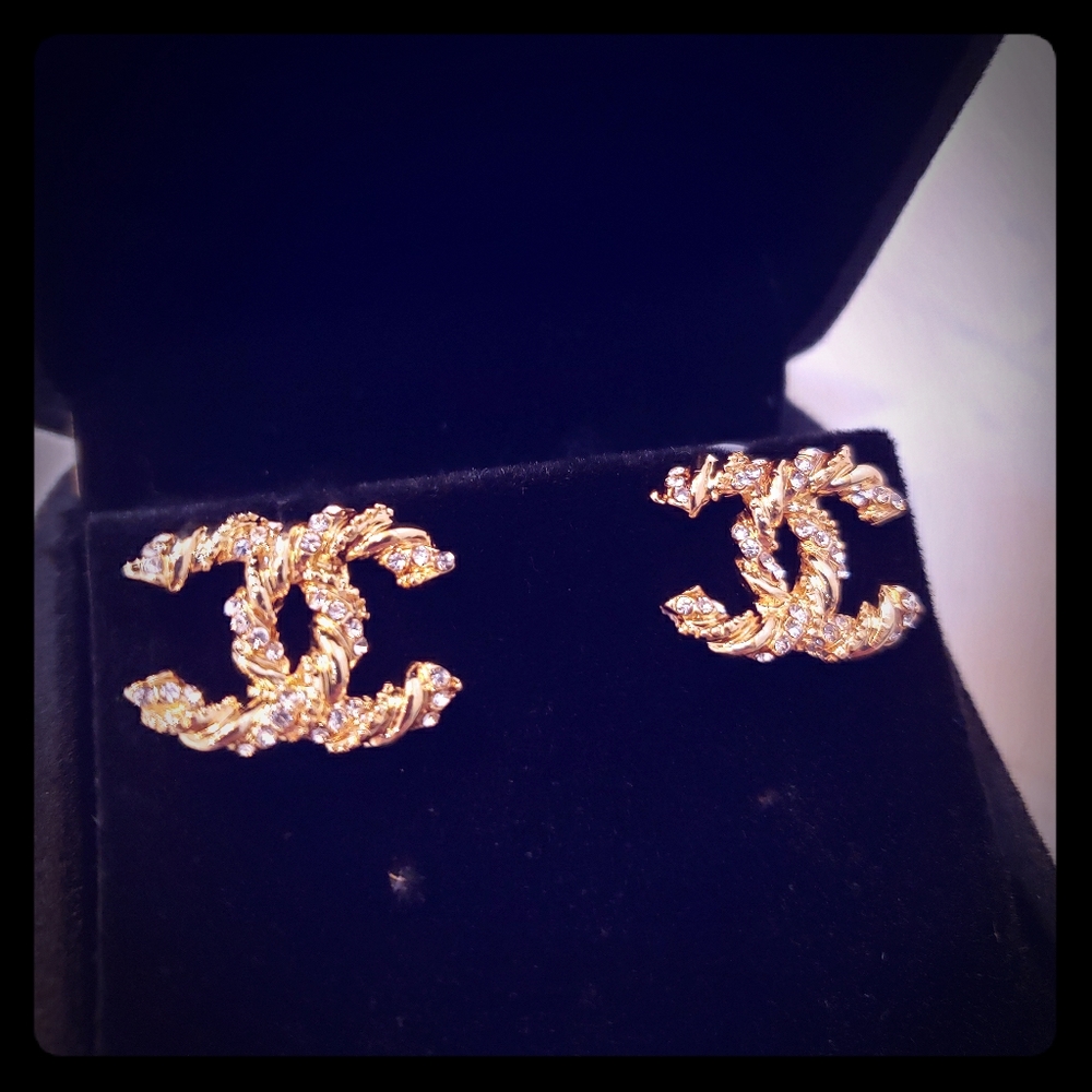 Vintage Coco Chanel small gold twist stud earrings